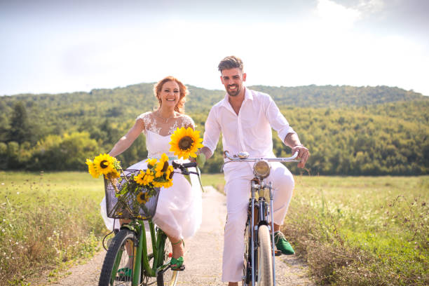 istock Happy couple riding bicycles outside, 638304574
