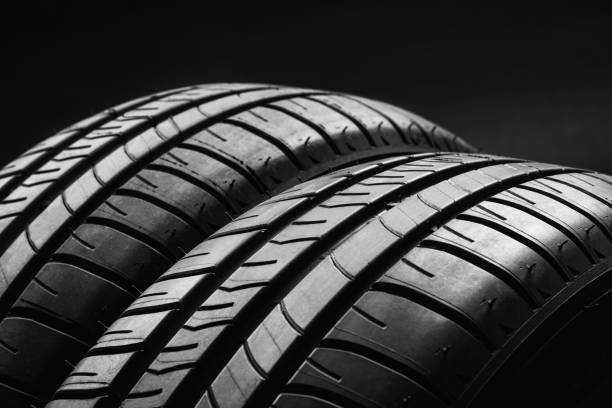 istock Summer fuel efficient car tires on black background 638304580