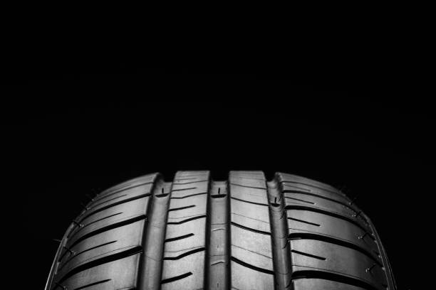 istock Summer fuel efficient car tires on black background 638304598