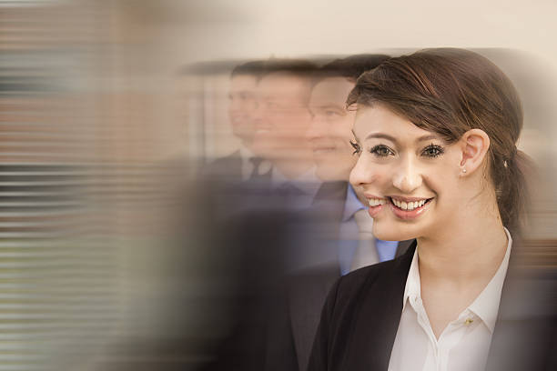 Teamwork Concepts with Business Person on Chalkboard Background
