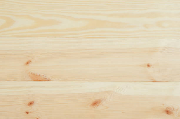 istock Fresh pine wood planks background top view 638306314