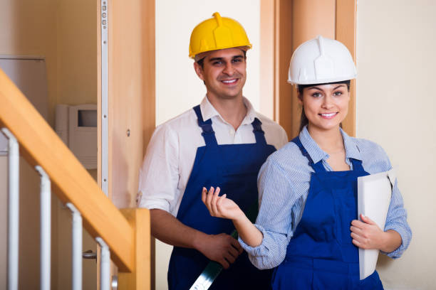istock Professional maintenance crew of two specialists indoors 638306480