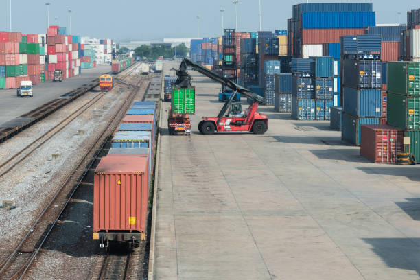 Cargo train platform with freight train container at depot stock photo