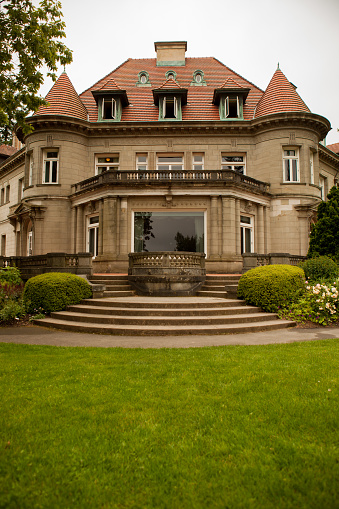 The historic Pittock mansion in Portland, Oregon. The Pittock Mansion is a French Renaissance-style château in the West Hills of Portland, Oregon, USA. The mansion was originally built in 1909 as a private home for London-born Oregonian publisher Henry Pittock and his wife, Georgiana
