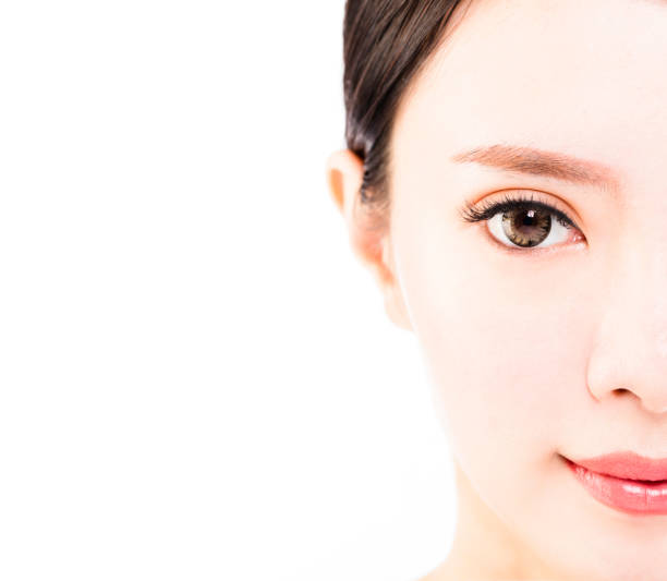 istock half face of young beautiful woman 638311056