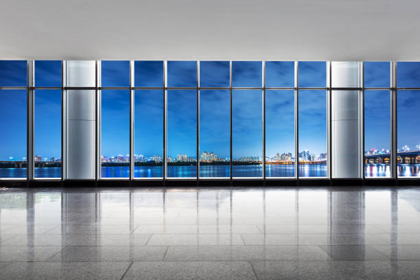 istock cityscape and skyline at night from window near river 638312088