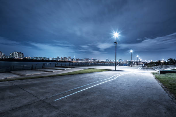 istock empty road near river in seoul at night 638312178