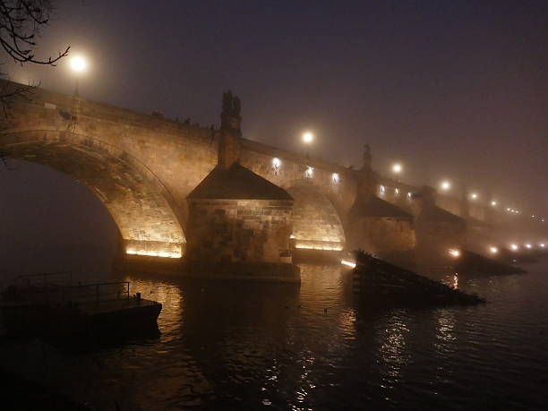 istock Charles Bridge on a foggy evening 638314786