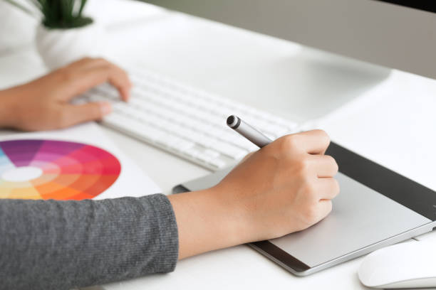 istock closeup graphic design using digital pen tablet on desk workspa 638317364