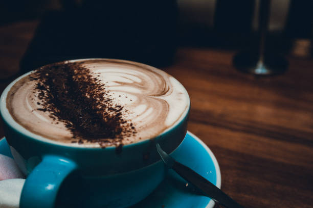 istock coffee with foam over wooden table 638318742