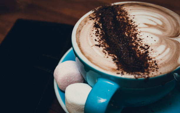 istock coffee with foam over wooden table 638318758