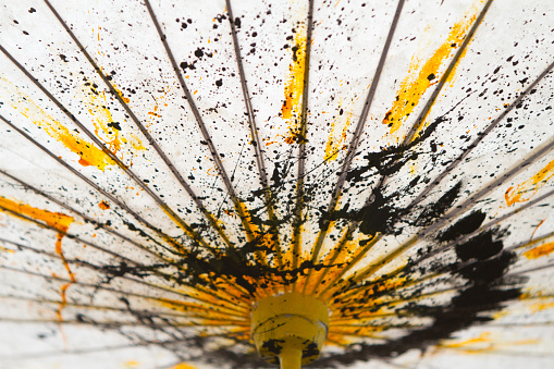 Japanese Mulberry Paper Umbrella Hand Painted with Yellow and Black.