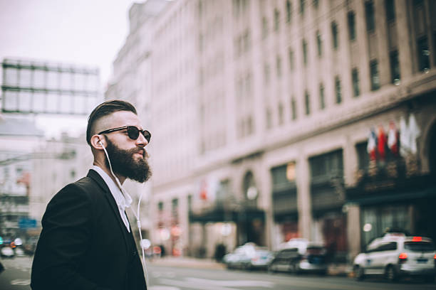 istock Man listening music 638323328