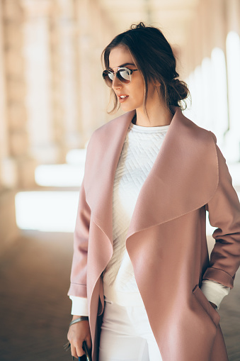 Portrait of a beautiful classy woman outdoors.