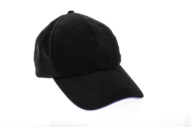 istock Black golf cap with purple colour trim on white background 638327762