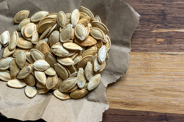istock Grilled Pumpkin seeds with sea salt and spices 638329128