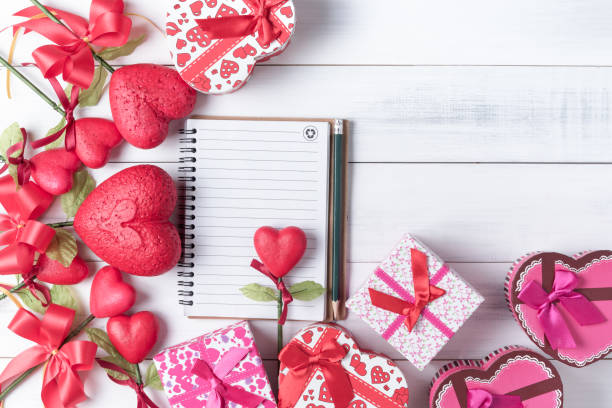 istock blank notebook with pencil and Valentine Heart Shape Gift Box 638330854