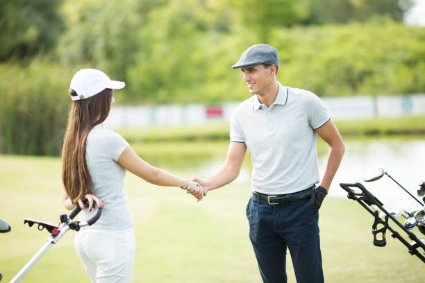 istock Young couple at golf cart 638333024