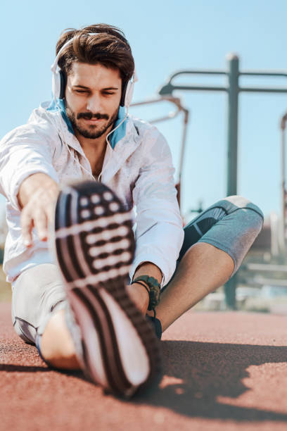 istock Runner stretching his legs after running training. Sport concept 638333876