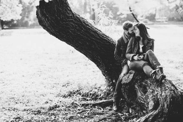 istock Loving couple in autumn park 638335040