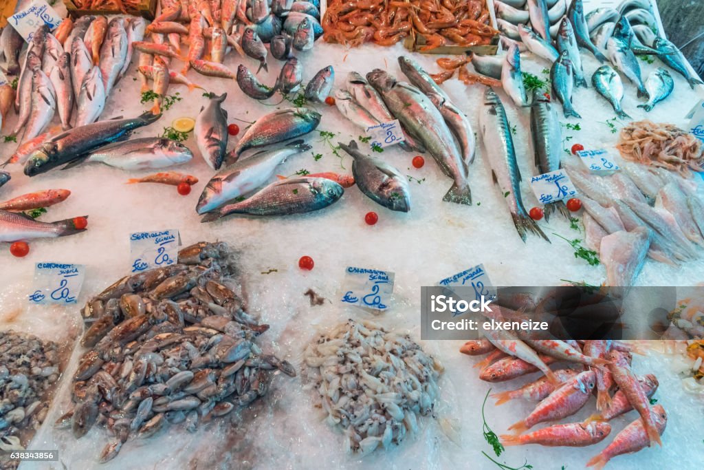 Fresh fish and seafood in Sicily Fresh fish and seafood seen at a market in Palermo, Sicily Calamari Stock Photo