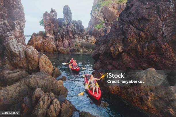 Kayaking Adventure Travel Group Of People On Kayaks Stock Photo - Download Image Now