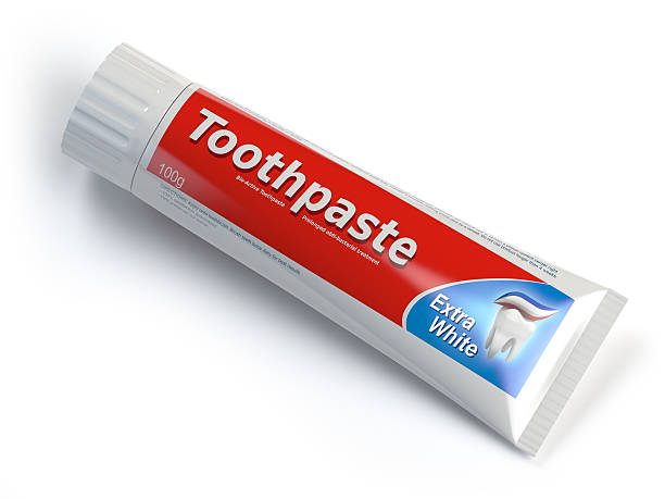 ttoothpaste behälter auf weißem isoliertem hintergrund. - toothpaste stock-fotos und bilder