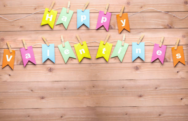 istock happy valentines note cards hanging from clothesline 638352854