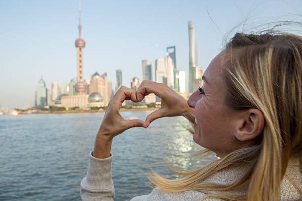istock Young woman loving Shanghai, China 638355330