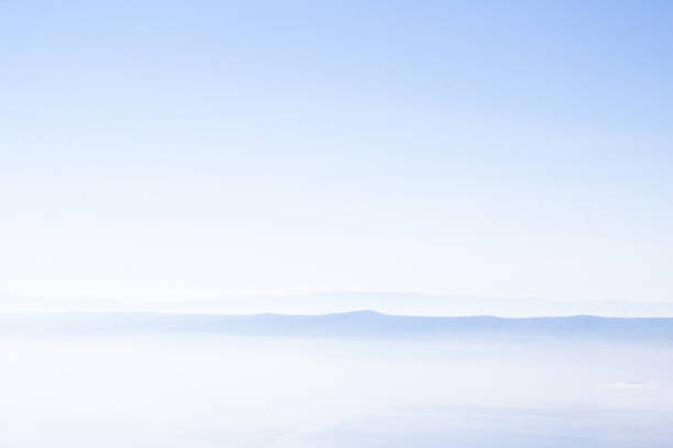 istock View on island peak in bright morning mist, fog, cloud 638360148