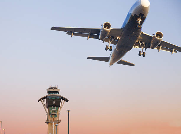 istock Air Trafic Control tower and airplane at LAX 638361060