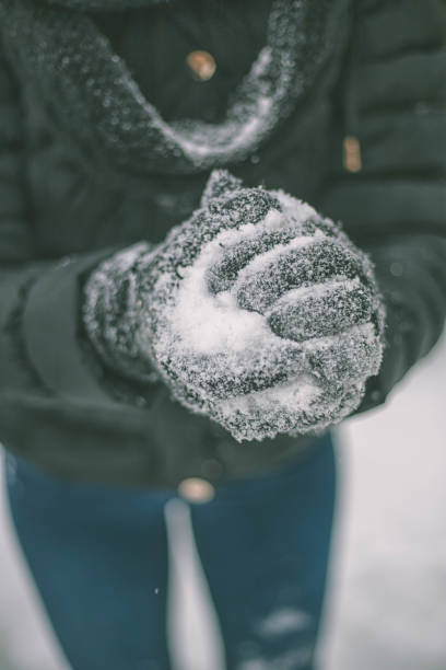 istock Snowball fight in winter 638362396