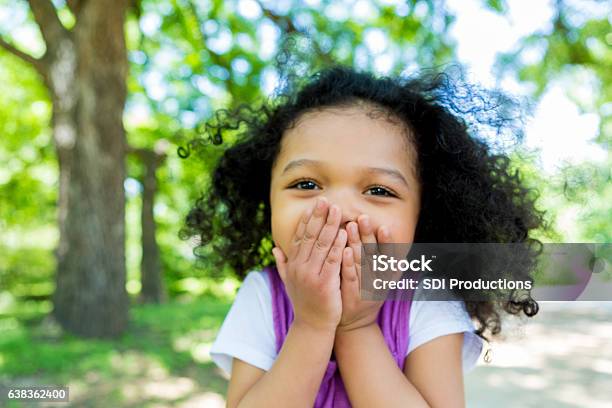 Adorable Mixed Race Girl In The Park Stock Photo - Download Image Now - Child, Surprise, Toddler