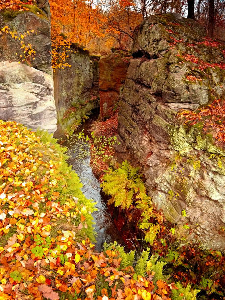 istock Small romantic Brehynska prurva chasm in Macha's land in autumn 638363412