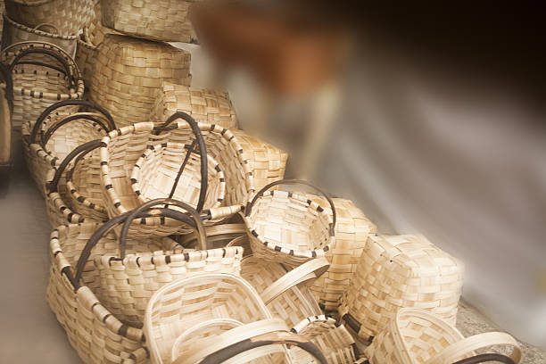 istock Hand made baskets in a street market stall. 638365462