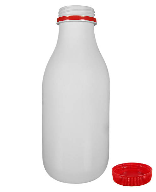 istock Bottle of milk isolated - opened 638367600