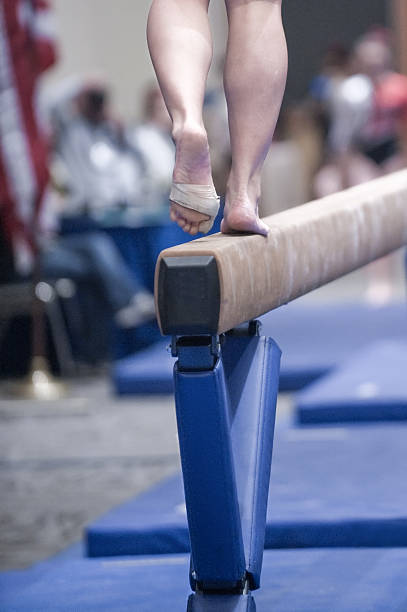istock Gymnast on Balance Beam 638368204