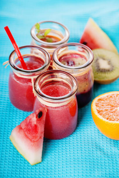 istock Jars with smoothies and fruits 638370314