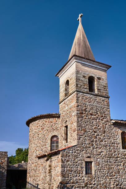 istock The stone bell tower of a medieval church 638370896