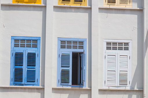 Colorful windows of colonial old building