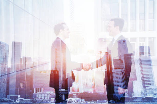 istock business deal, handshake double exposure, cooperation concept 638373174