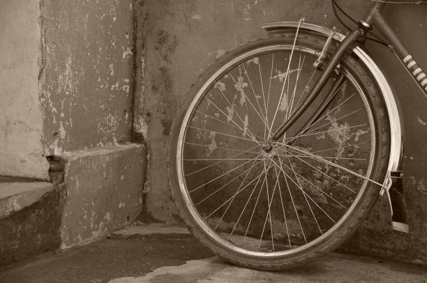 istock old bicycle tire leaning on old rusted wall 638376564