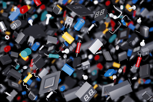 3D render of a variety of electronic components on a dark background