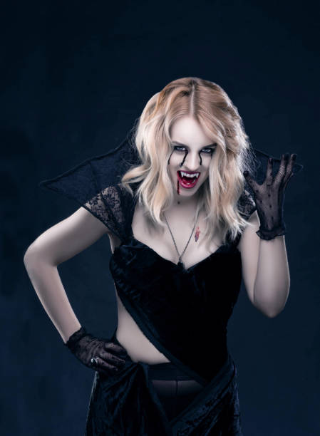istock Beautiful blonde girl vampire. 638378528