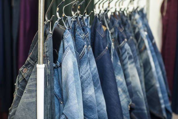 istock Row of hanged blue jeans 638379534
