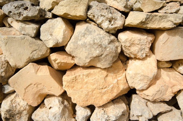 istock Old stone wall texture for background surface natural color 638380602