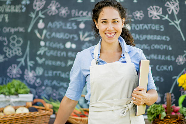 istock Farmer Selling Her Produce 638384512