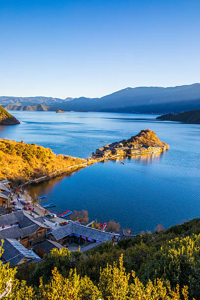 12 photos were used to record the 25-year changes of the Lige Peninsula by Lugu Lake. The 25 years are from 1998 to 2022.