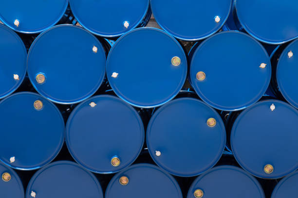 blue steel chemical tanks or oil tanks stacked in row. - opec 個照片及圖片檔