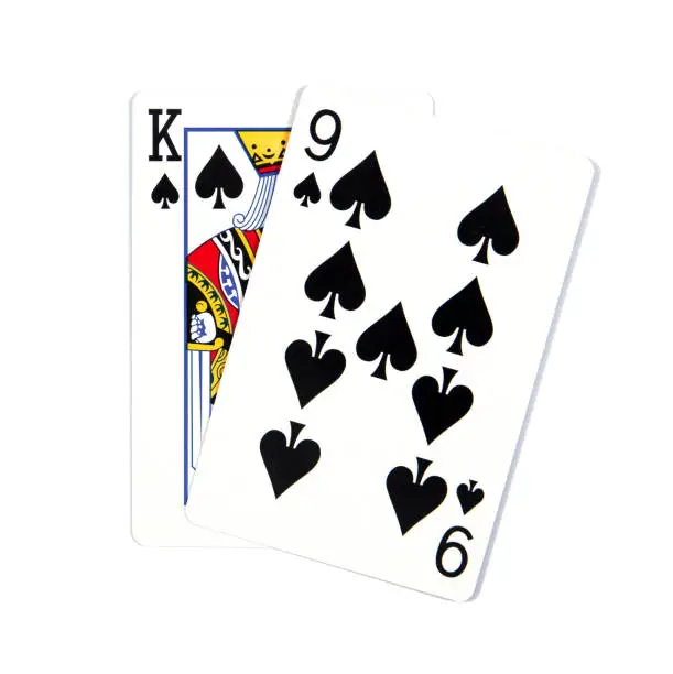 Two cards isolated on white.K and 9 the queen of spades isolated on white background